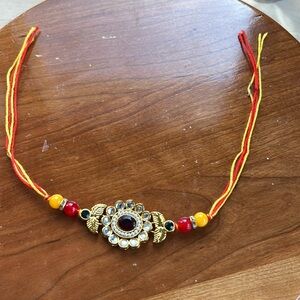 Vintage bracelet yellow and red with string band